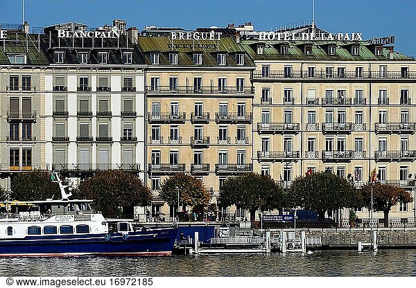 Quai du Mont -Blanc along Lake Geneva  first building on right - Five-star luxury historic hotel Ritz-Carlton Hotel de la Paix  Geneva  Switzerland  Europe
