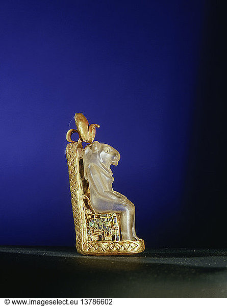 Quartz amulet of the lion headed goddess Bastet seated on a gold throne  From the tomb of Wen djeba en djed  senior official of Psusennes I. Egypt. Ancient Egyptian. 21st Dynasty  1039 991 BC. Tanis.