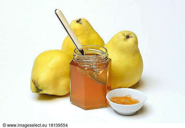 Quince jelly in glass with spoon  quince  Cydonia oblonga