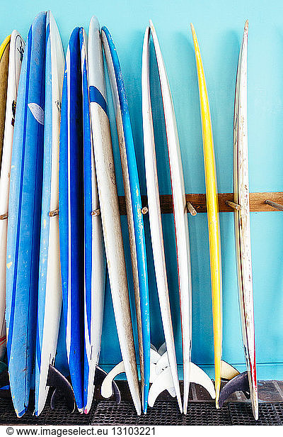 Rack of surfboards in shop