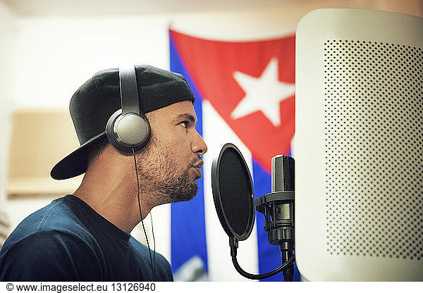 Radio jockey in recording studio