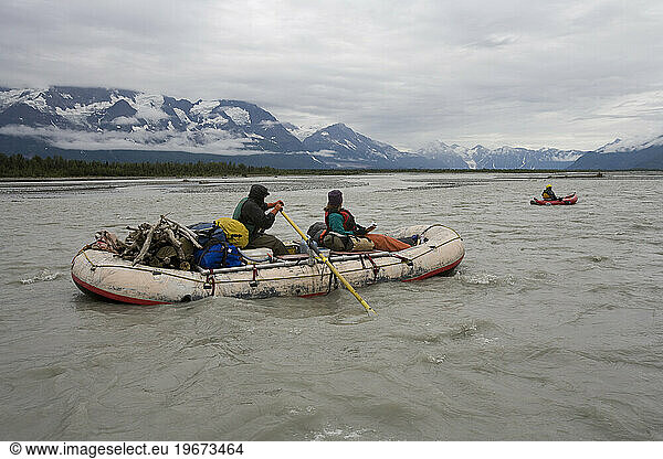 Raft floating down river in the Yukon Territory  Canada.