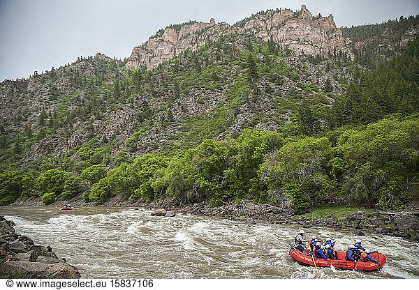Rafters paddle the Colorado River through Glenwood Canyon  Colorado
