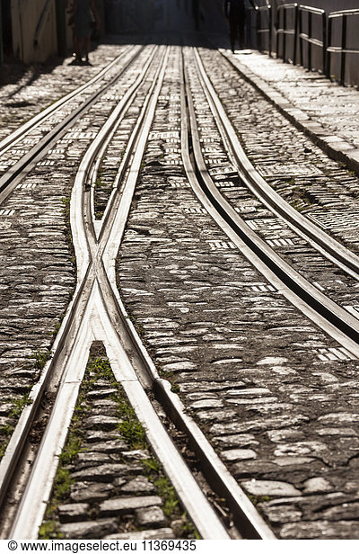 Railroad tracks on city street  Lisbon  Portugal
