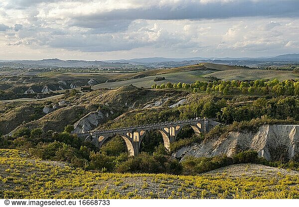 Railway bridge in the hilly landscape of the Crete Senesi  Asciano  Siena  Tuscany  Italy  Europe