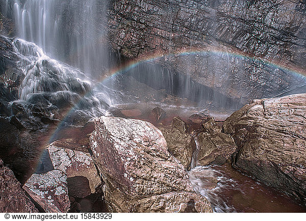 Rainbow formation in a beautiful waterfall