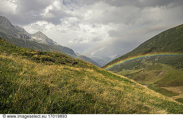 Rainbow over mountain landscape