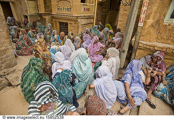 Rajasthan`s women seated on floor during a funeral in the city`s fort
