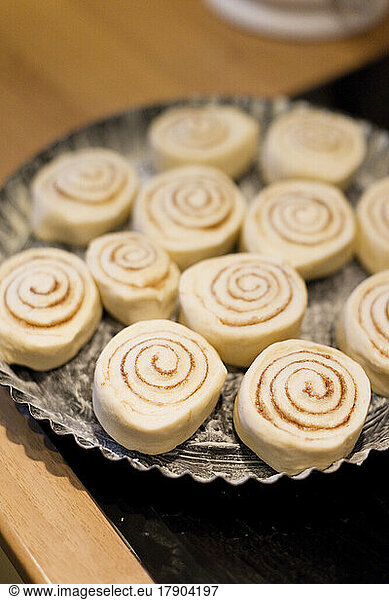 Raw cinnamon buns ready for baking