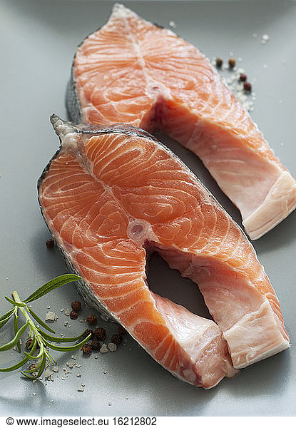 Raw salmon in plate  close up