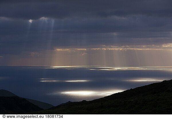 Rays of sunshine break through the cloud cover  Tenerife  Canary Islands  Spain  Europe