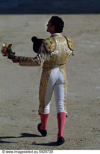 Rear view of a bullfighter standing in a bull ring  Provence  France