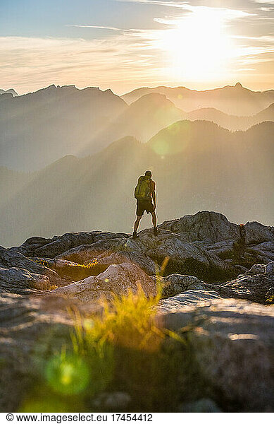 Rear view of hiker on tranquil mountain ridge  Vancouver B.C.