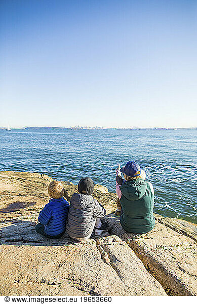 rear view of mother point towards the city from opposite shore.