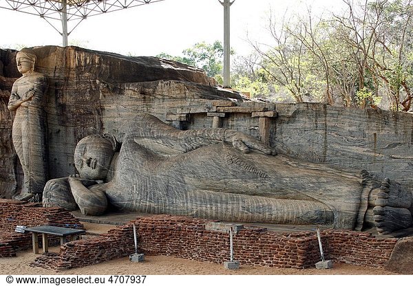 Recline statue of Buddha ,  World Heritage site ,  ancient city of Polonnaruwa ,  Sri Lanka