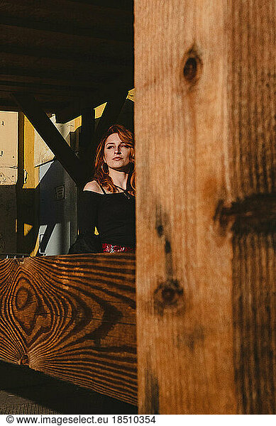 red-haired woman in train station
