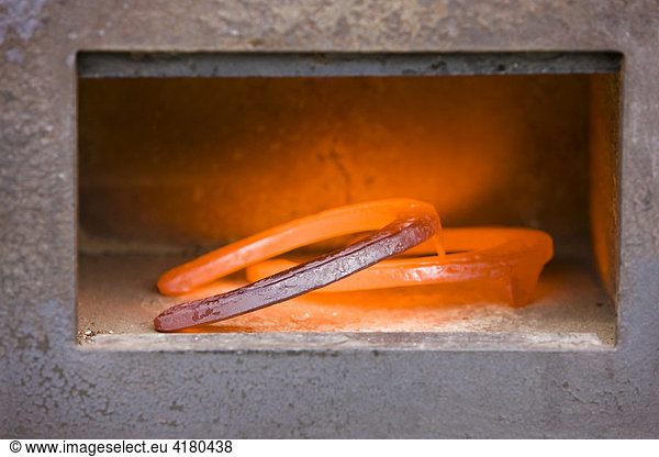 Red hot horseshoes in a stove  North Tyrol  Austria  Europe
