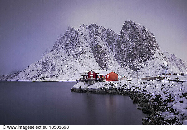Red houses and beautiful mountain in Stunning Norway