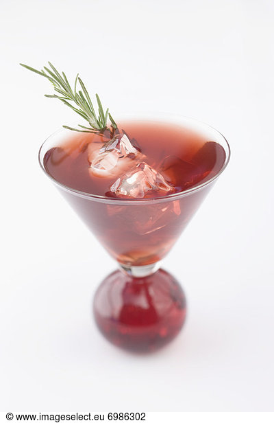 Red Martini with Rosemary Garnish