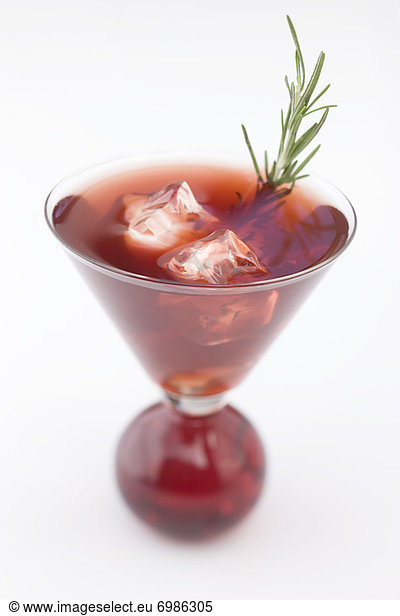 Red Martini with Rosemary Garnish