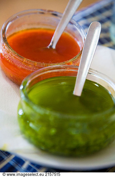 Red ´mojo picón´ and green ´mojo verde´  typical sauces. Lanzarote  Canary Islands  Spain