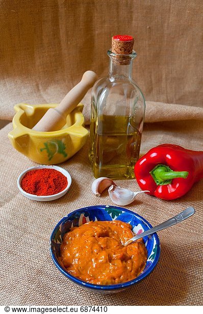 Red mojo with ingredients. Canary Islands  Spain.