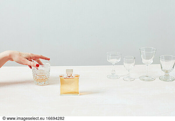 Red nails  perfume  whiskey  glasses