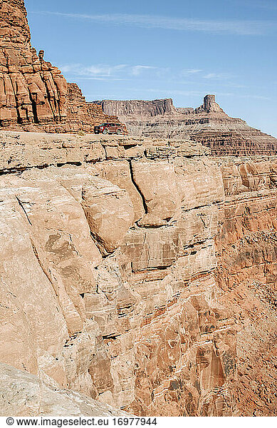 red pick up truck on the edge of a cliff near Moab Utah