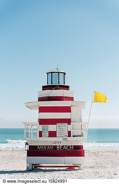 Red-white striped attendant's tower with yellow flag  Florida  USA