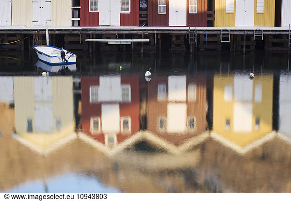 Reflection of house on river