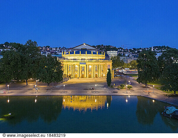 Reflection of Stuttgart State Theatre reflecting in water at night  Stuttgart  Germany