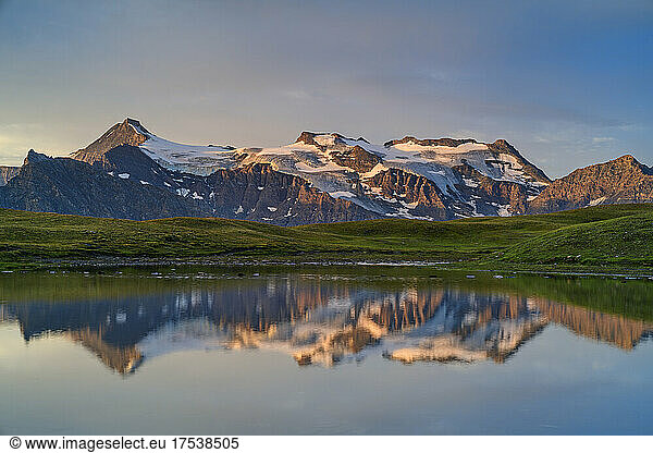Reflection of Vanoise Massif mountain in lake  Vanoise National Park  France