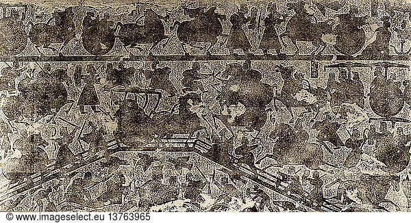 Reibung eines Reliefs aus Grabsteinen  das Kriegswagen und Schlachtszenen darstellt  China. Datum: Han-Dynastie  300 v. Chr. 200 n. Chr. Material: Lehmziegel.