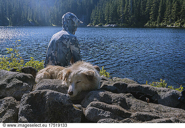Relaxing next to an alpine lake in the cascades