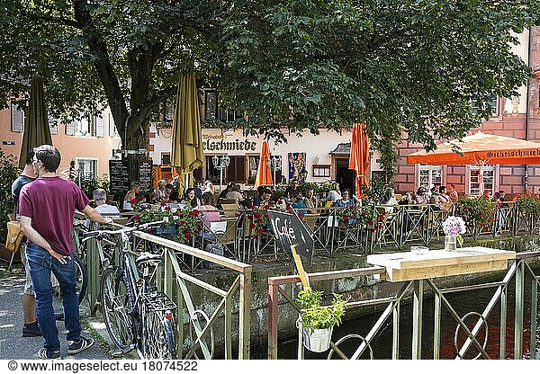 Restaurant with outdoor seating on the island on the Gewerbekanal  Freiburg im Breisgau  Baden-Württemberg  Germany  Europe