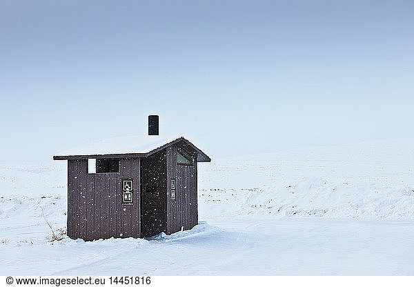 Restroom in a Snowy Landscape