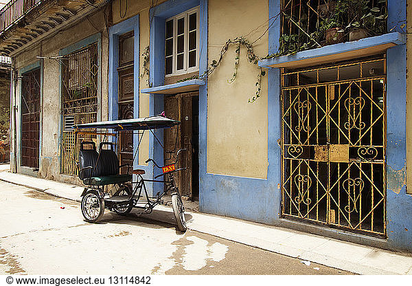 Rickshaw parked on street