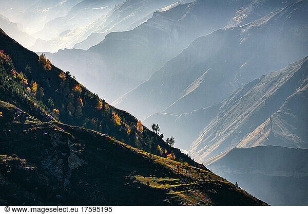 Ridge in Caucasus Mountains on foggy autumn day