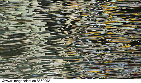 Ripples on the water surface in Juneau boat harbor. Alaska  USA