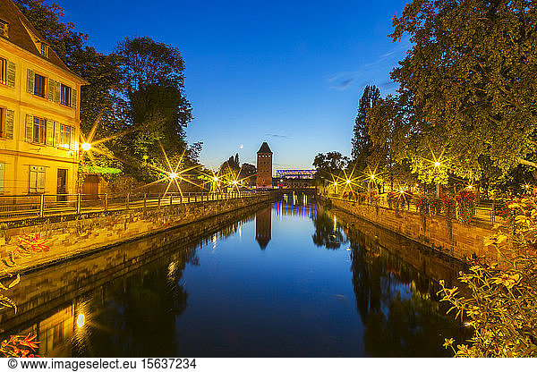 River ill against blue sky at dusk  Strasbourg  France