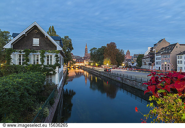 River ill along with buildings against sky at dusk  Strasbourg  France