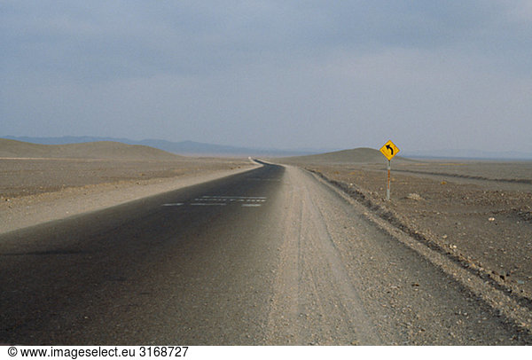 Road and road sign  Atacama desert  Chile.