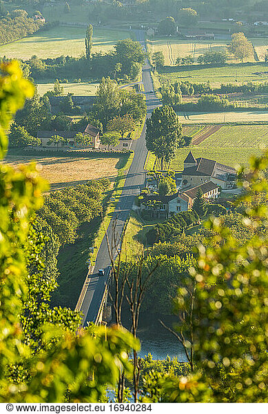 Road & early morning mist  Dordogne nr Chateau de Castelnaud  Dordogne  Aquitaine  France