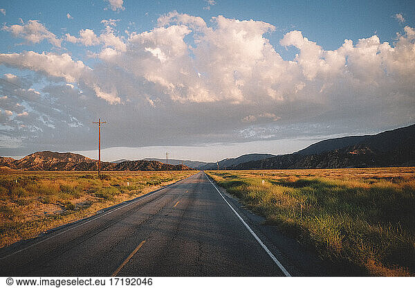 Road Extends Through Cuyama Valley at Sunset