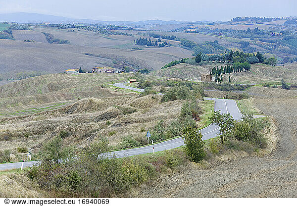 Road in rural hilly landscape.