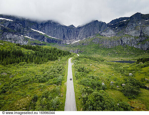 Road leading toward mountain at Nusfjord  Lofoten  Norway