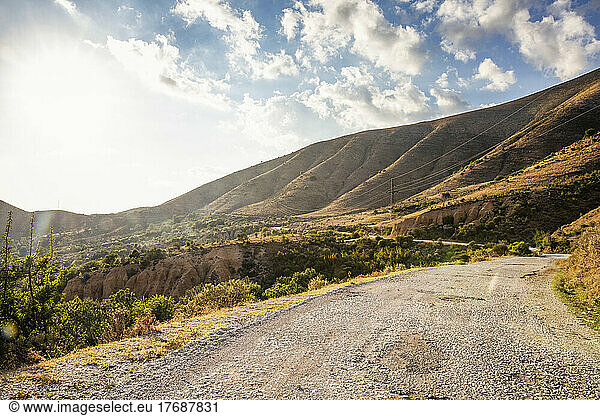 Road leading towards Mali I Gjere mountain on sunny day  Albania