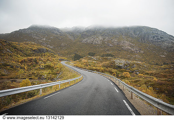 Road leading towards mountain