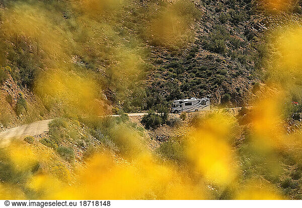 Roadbear RV Camper on a gravel road  Apache Trail  near Tortilla Flats  Arizona  USA.