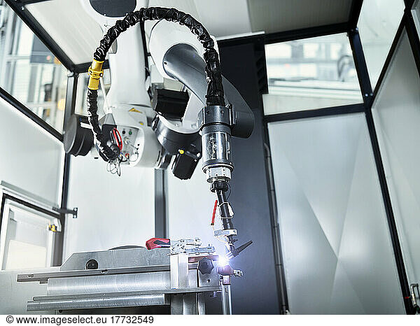 Robotic arm welding in industry